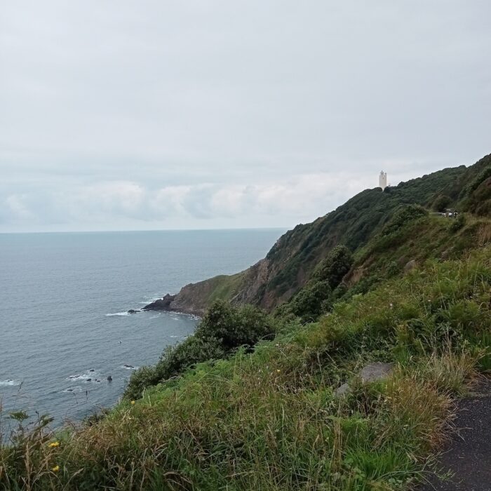 The towering Bizkaya cliffs leading to the lighthouse