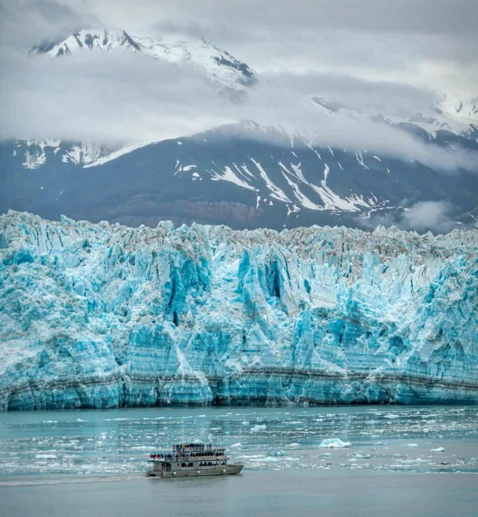 BOAT IN FRONT O iceberg-in-alaska