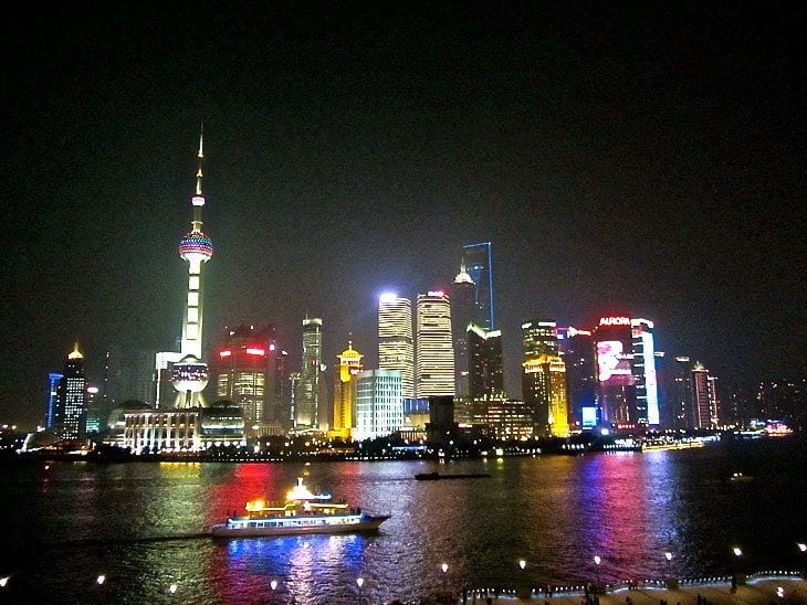 shanghai's skyline lit up at night