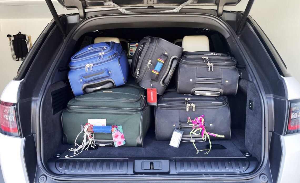 Luggage packed inside the trunk of a vehicle