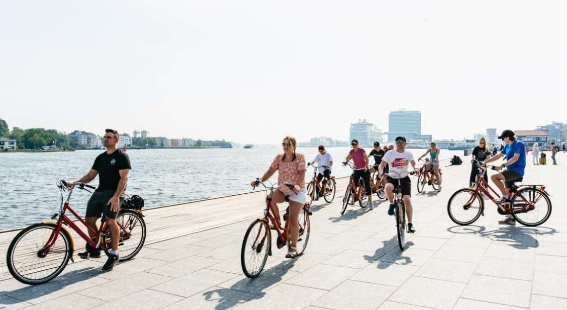 Tourists on a Amsterdam Guided Bike Tour