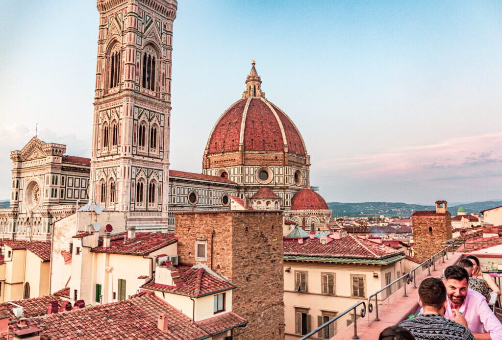 rooftop bar overlookng the dome and tower of florence duomo