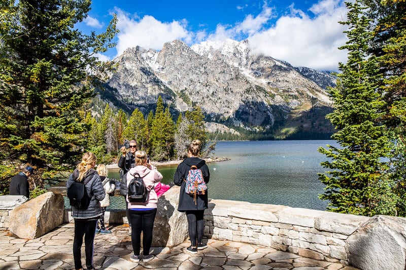 girls Overlooking Jenny Lake taking photos