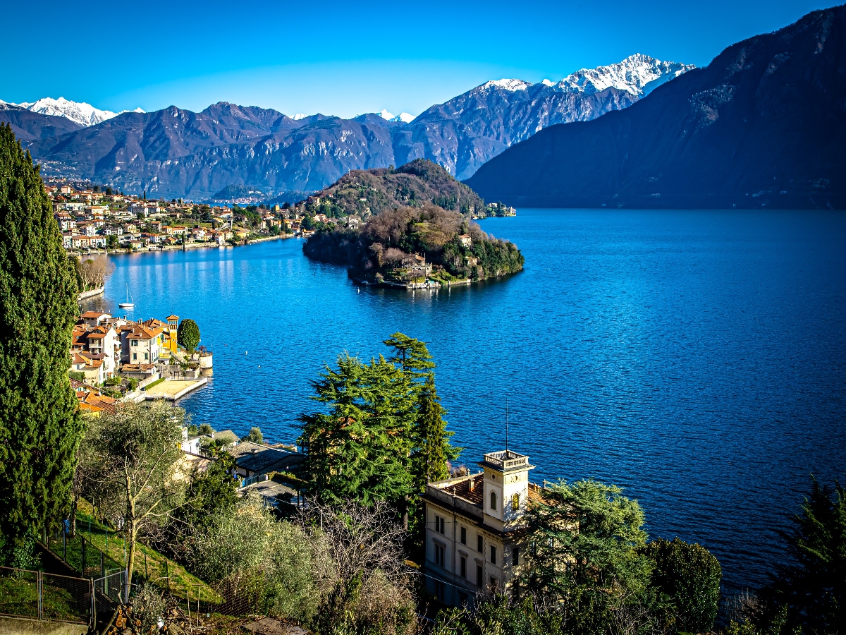 where to stay lake como overview of mountains and towns on water 
