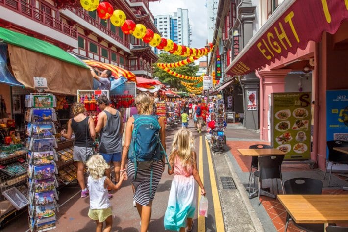 caz and girls walking through chinatown