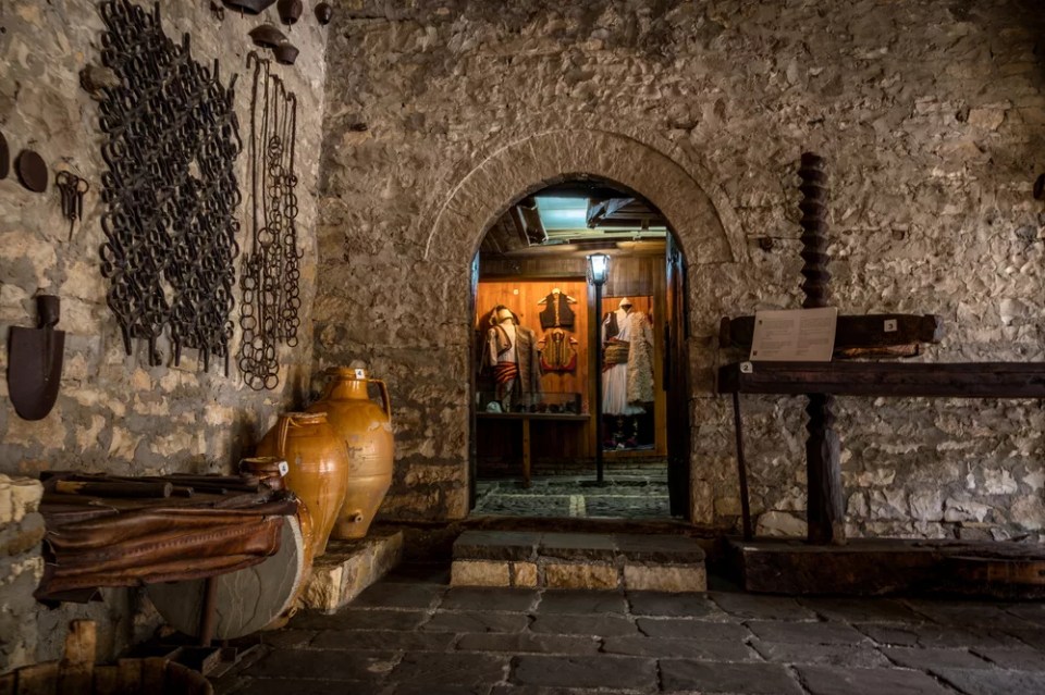 Berat, Albania - November 18 2022: interiors and exhibited artefacts in Ethnographic museum in Berat, UNESCO city in Albania. High quality illustration