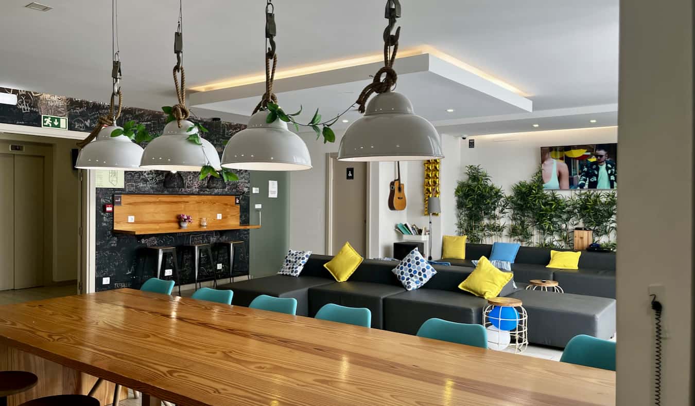 A spacious, large common room in the Top City hostel in Lagos, Portugal