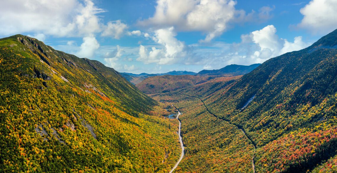 The view of Crawford Notch Road from Mount Willard, one of the best fall foliage hikes in New Hampshire