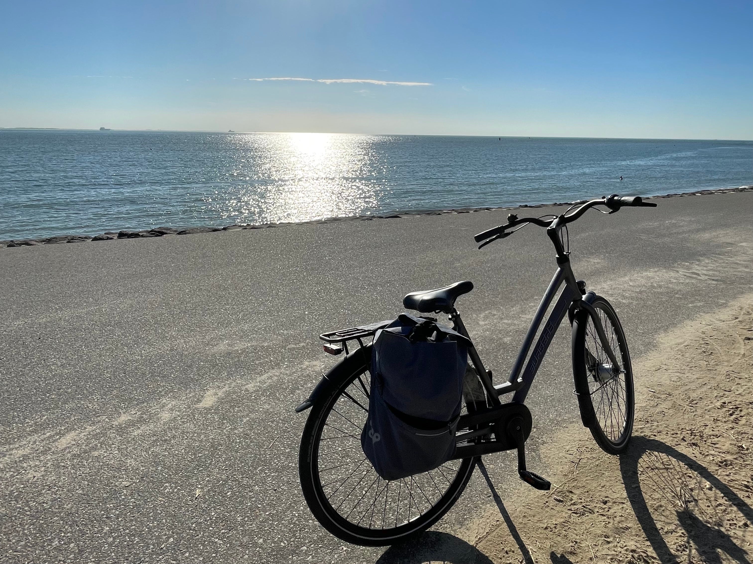 <p>Solo cycling: Jini takes in the view from Westduin beach, Vlissingen</p>