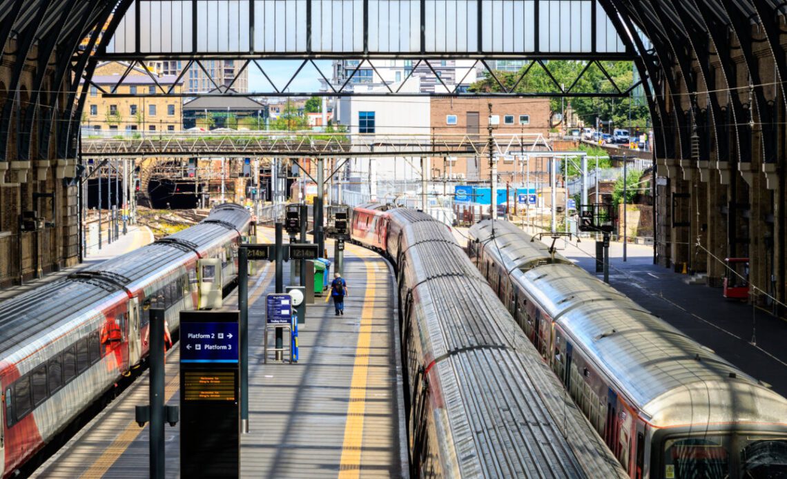 Trains stop at the platforms in Kings Cross train station