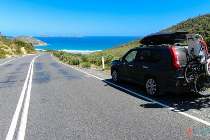 car on side of road with ocean views at Wilsons Promontory National Park, Victoria