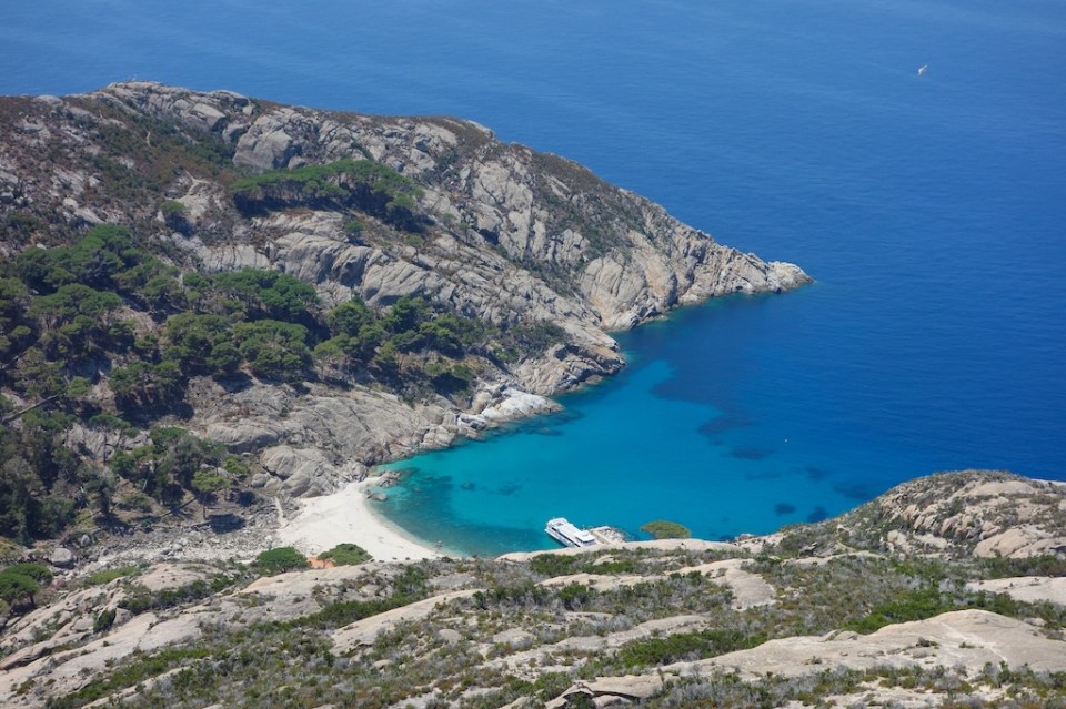 Cala Maestra beach at Island of Montecristo (formerly Oglasa) in the Tyrrhenian Sea part of the Tuscan Archipelago in Portoferraio, Italy