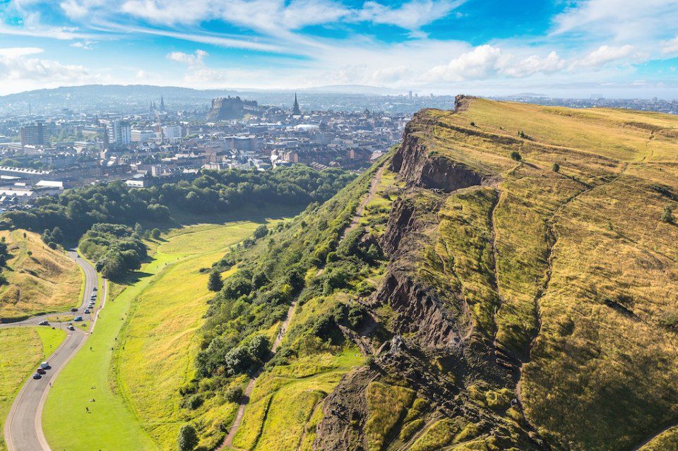 Cityscape of Edinburgh from Arthur's Seat in a beautiful summer day, Scotland, United Kingdom