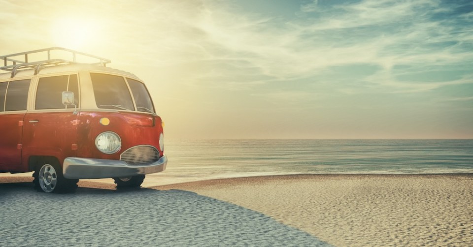 A red car on the sandy beach. This is a 3d render illustration. The car is a generic model.