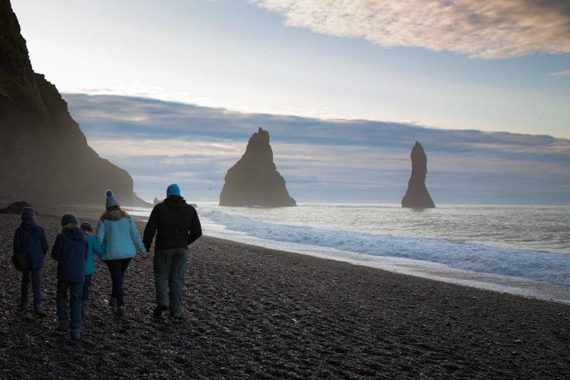 people walking on Reynisfjara Black Sand-Beach, Iceland