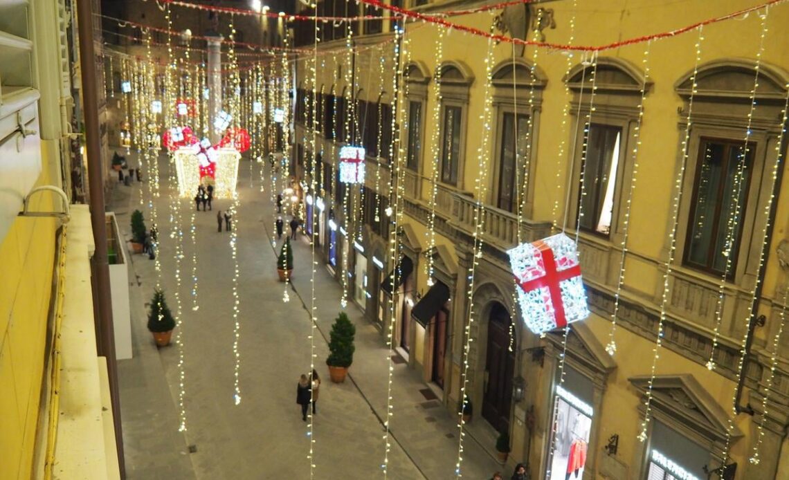 Festive Via Tournaboui in Florence with Christmas lights viewed from Hotel Milu