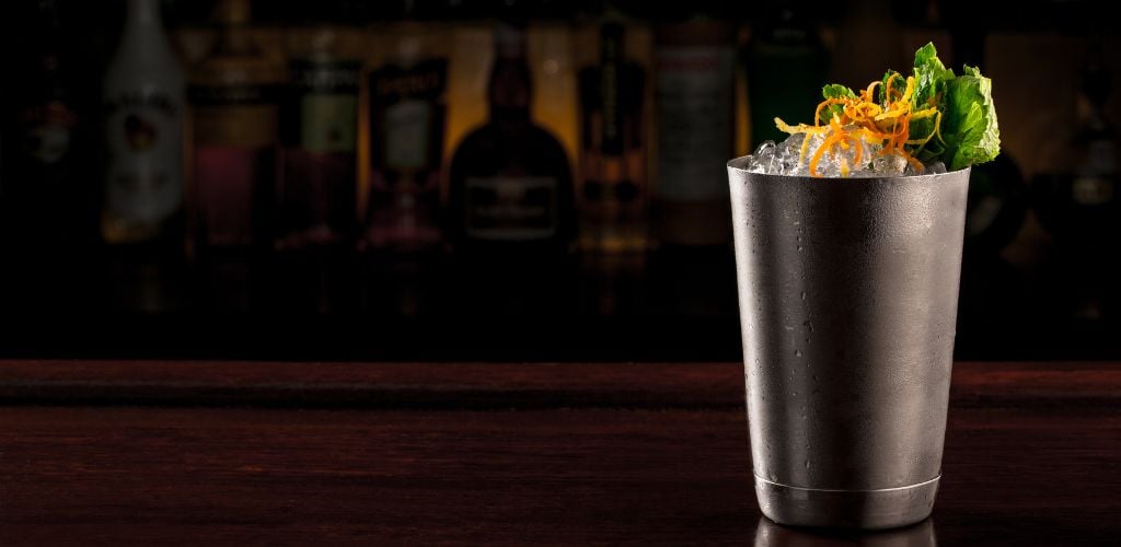 Georgia Mint Julep cocktail served in a metallic traditional cup. 