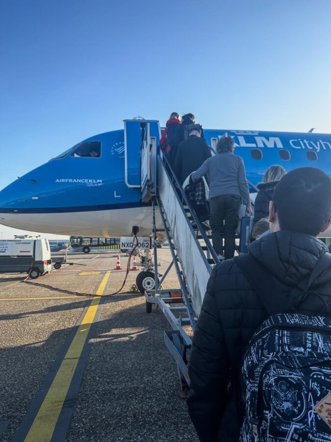 Passengers boarding KLM Cityhopper at Schiphol Airport
