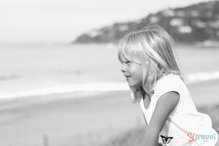 girl looking at beach