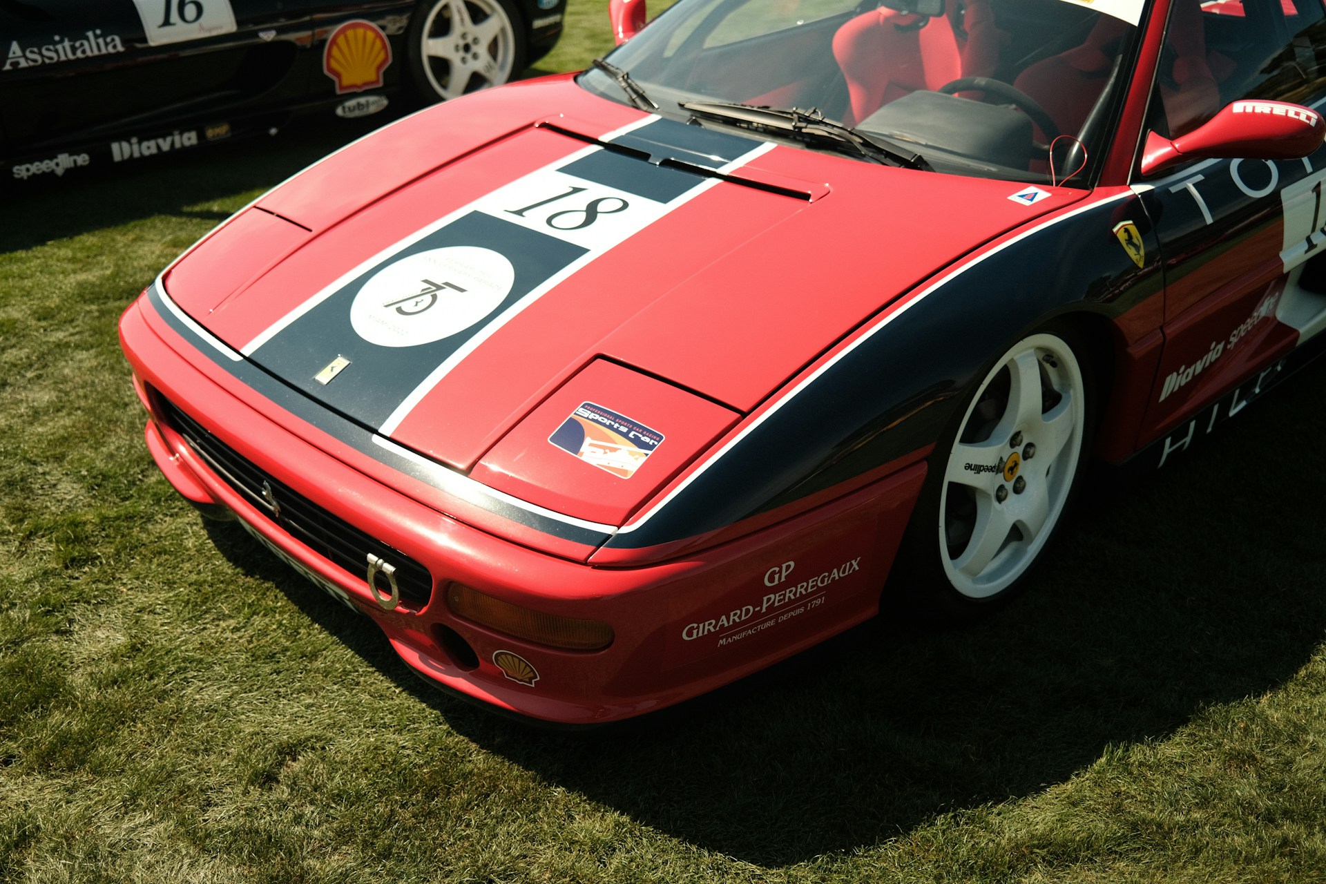 A red Ferrari at Pebble Beach Concours d'Elegance in California, one of the top international car shows. (photo: Patrick Konior)