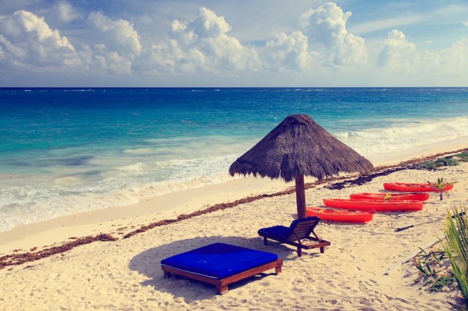 Beach chairs in luxury resort on carribean coast, Mexico