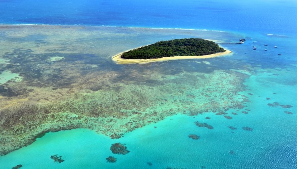 Aerial view of Green Island reef at the Great Barrier Reef near Cairns in Tropical North Queensland, Queensland, Australia.