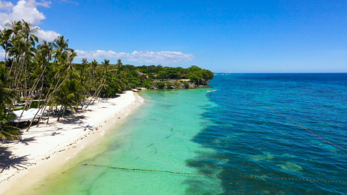 Sandy beach in Panglao island - Bohol Travel Requirements photo via Depositphotos