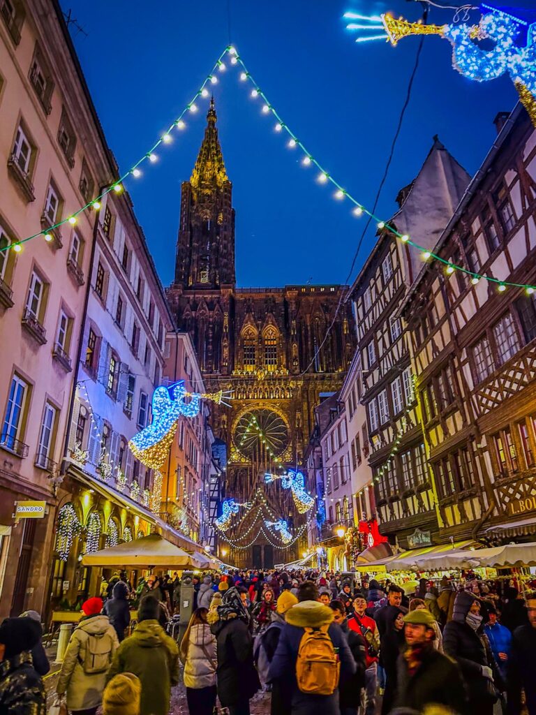 Strasbourg Christmas Market at night with Cathedral backdrop