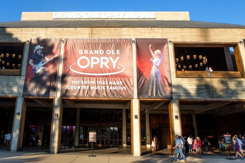 entryway to The Grand Ole Opry House with  music banner out front