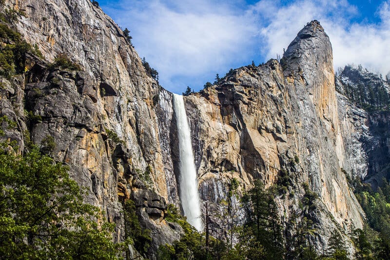 Bridalveil Falls spilling over high granite cliff face