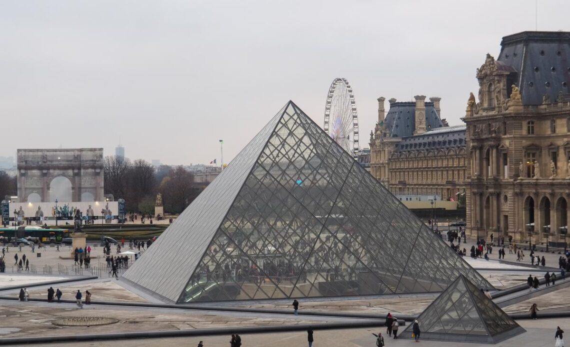 Louvre Pyramid against Paris