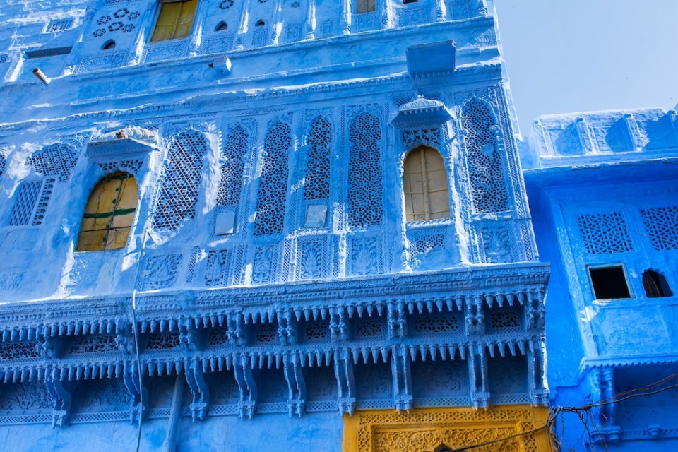 Traditional blue windows and wall in Blue City Jodhpur, India.