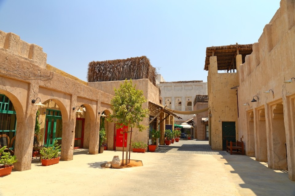 Old Dubai of buildings and traditional Arabian streets. Historical Al Fahidi neighborhood, Al Bastakiya in in Dubai