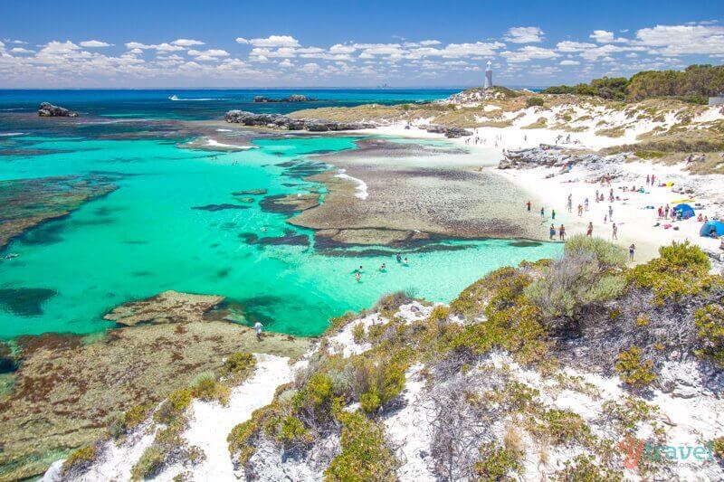 overlooking stunning pinky beach on rottnest with white sand and turquoise water