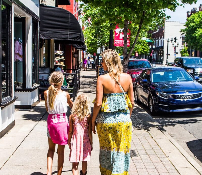 family walking on street in Downtown Franklin TN