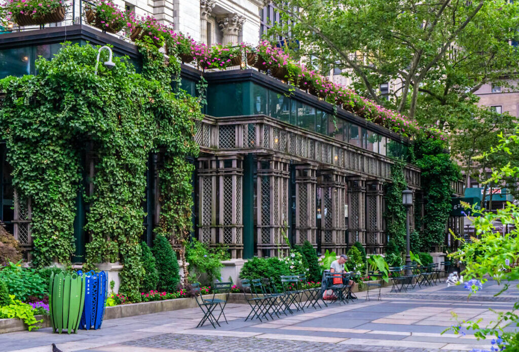 Bryant park cafe exterior building covered with ivy vine and flowers
