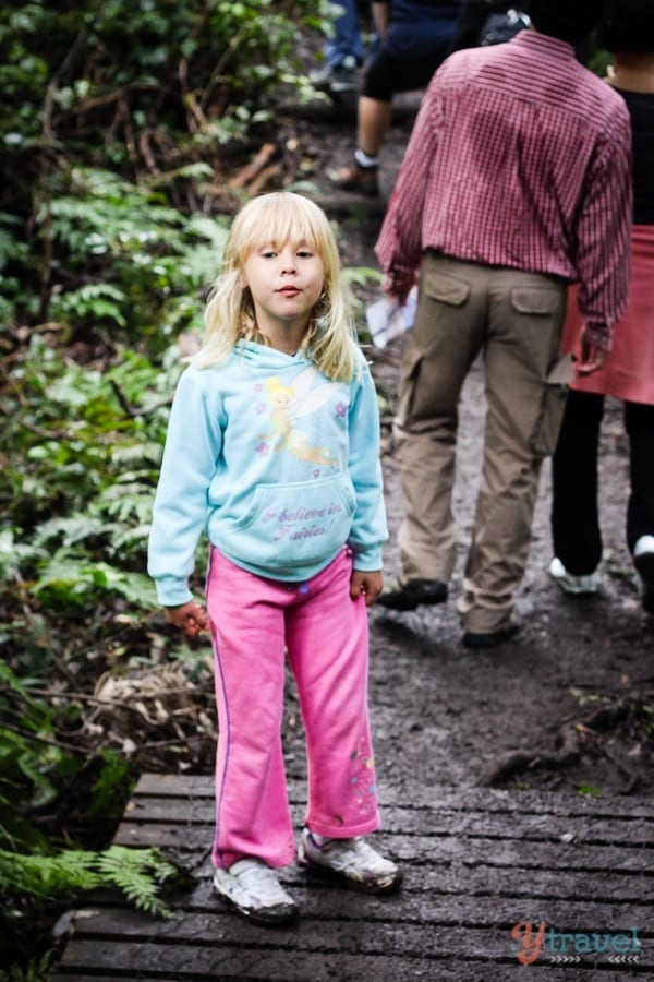 young girl walking on trail