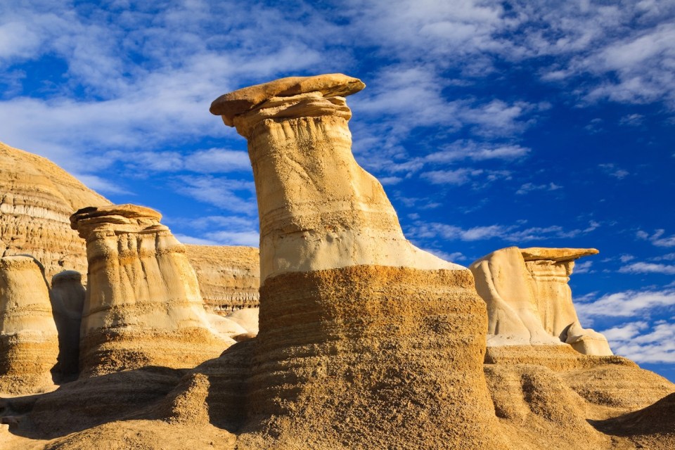 Hoodoos, a geologic formation on a bright day in the badlands near Drumheller, Alberta, Canada