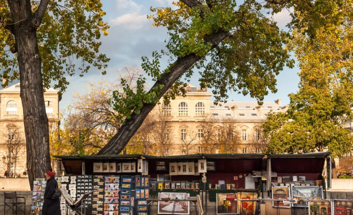 Les bouquinistes de la Seine or the Paris second-hand booksellers green box stalls by the Seine river in Paris, France