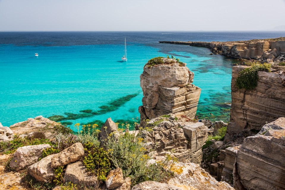 The shore in Cala Rossa, one of the beautiful bays in Favignana, one of the Aegadian Islands in Sicily