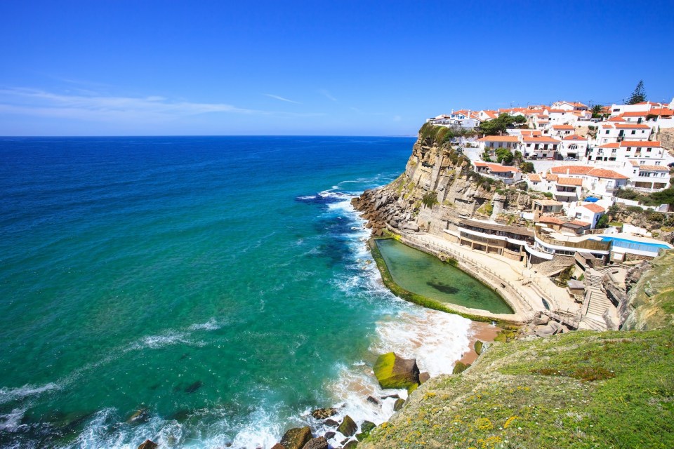 Azenhas do Mar white village, cliff and ocean, Sintra, Portugal