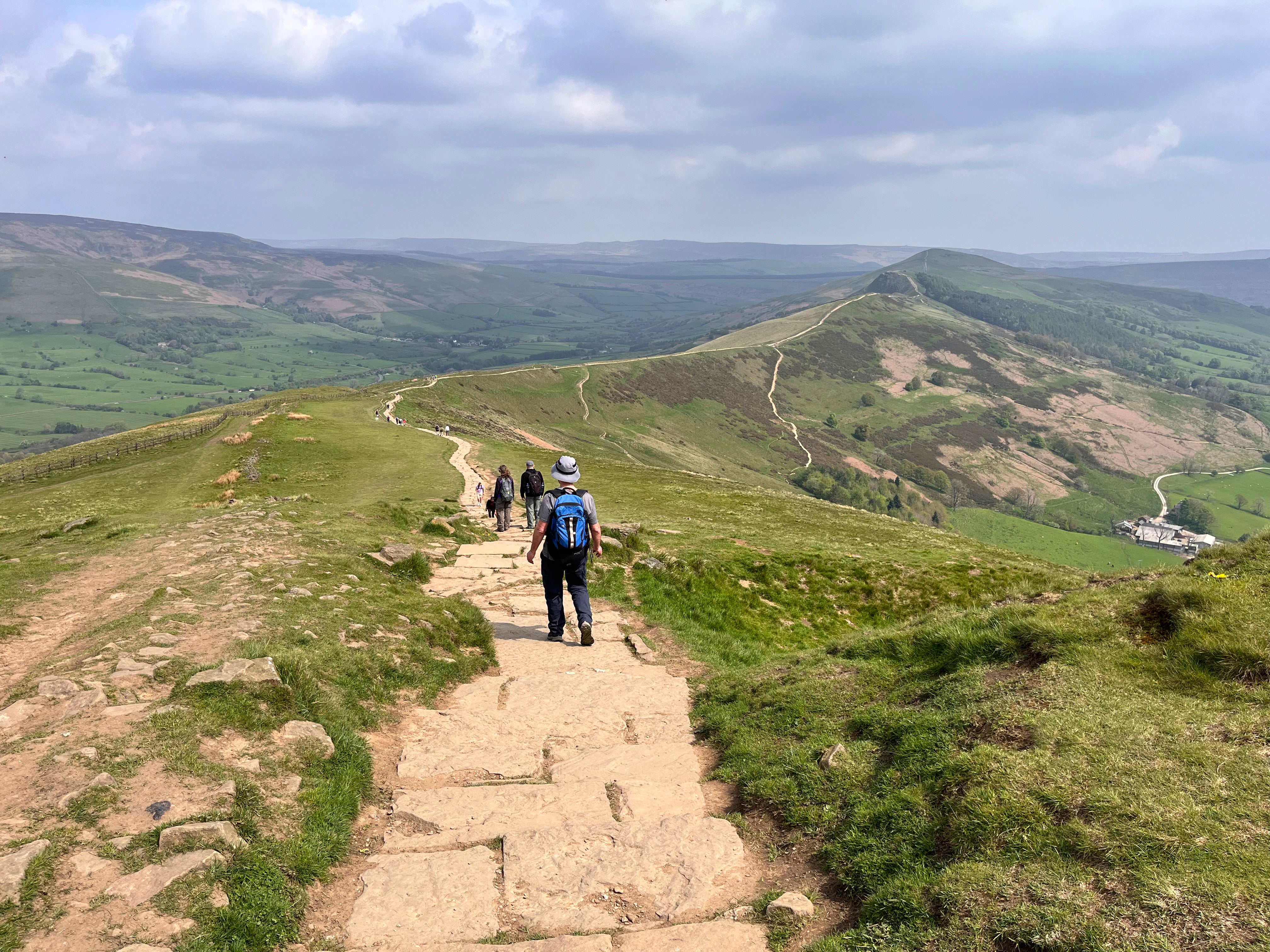 Hikers walk along the Great Ridge in England’s Peak District National Park on May 8, 2024. (Steve Wartenberg via AP)