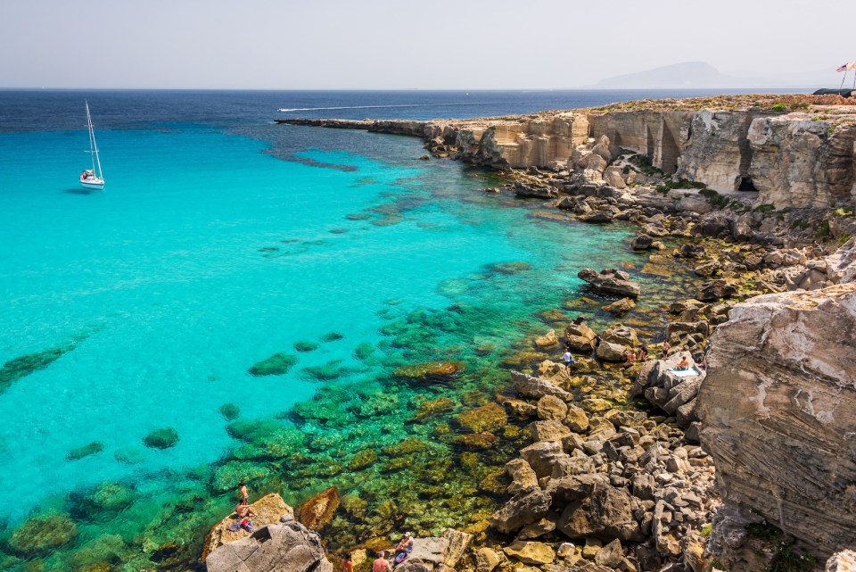 The shore in Cala Rossa, one of the beautiful bays in Favignana, one of the Aegadian Islands in Sicily