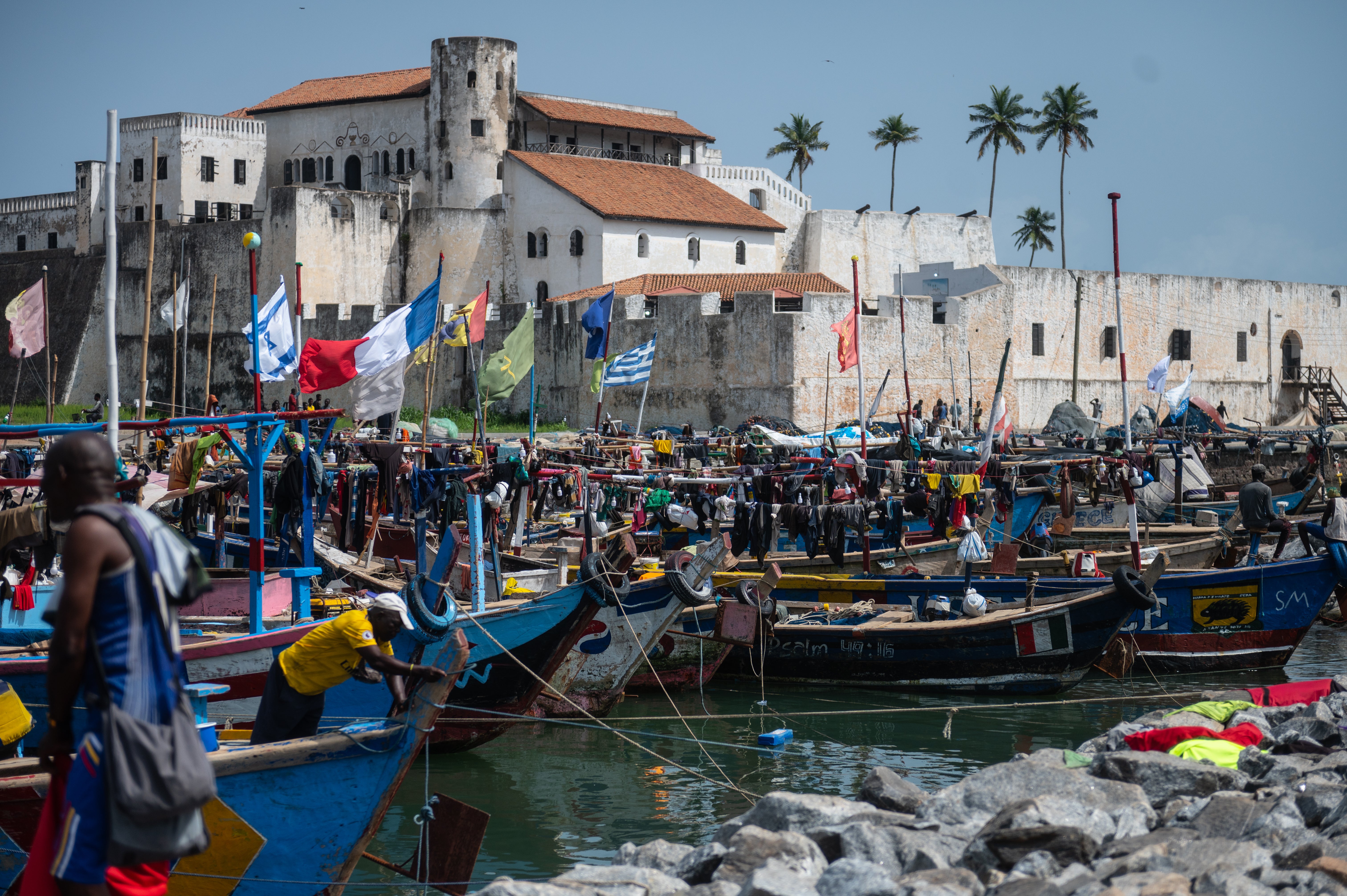 Boats bobbing in the water around Elmina, in Ghana