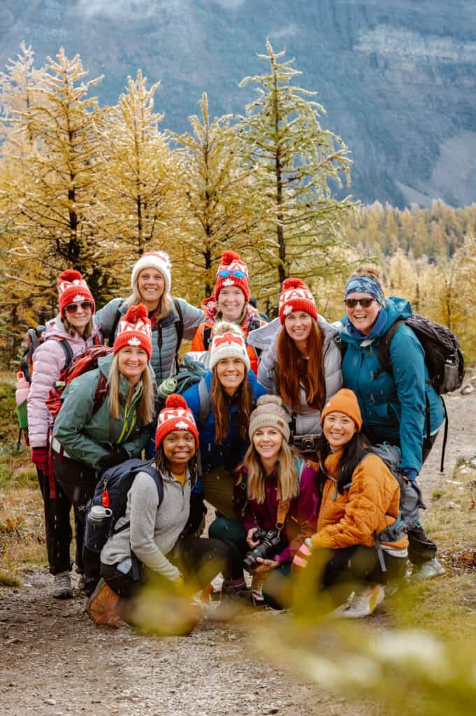 group of women posing on trail