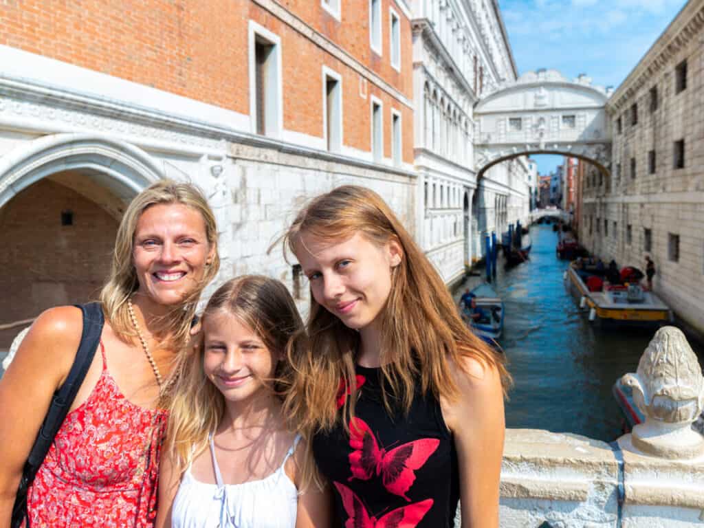 caz and girls posing in front of bridge of sighs