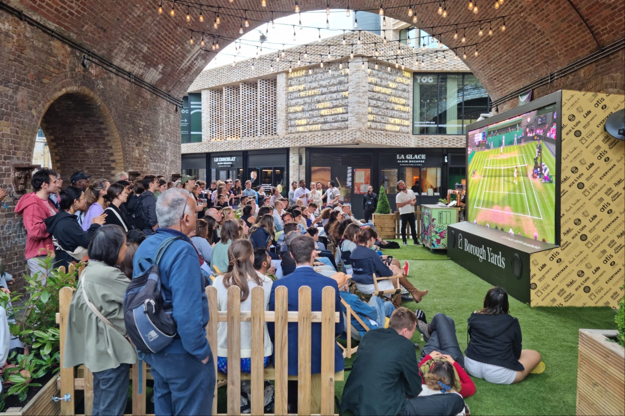 A Wimbledon-themed big screen has all the action from the courts
