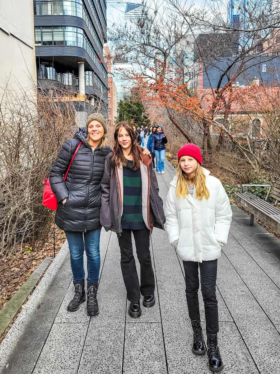 family walking the high line new york win winter