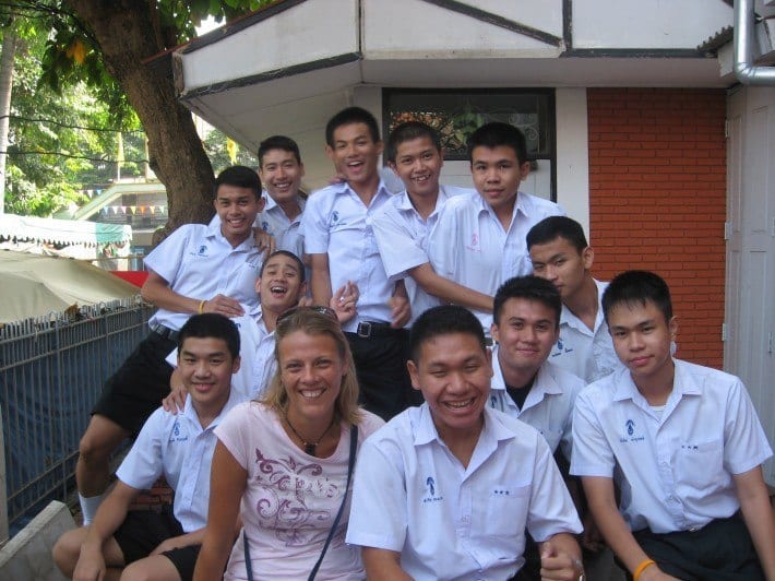 foreign teacher with students in bangkok