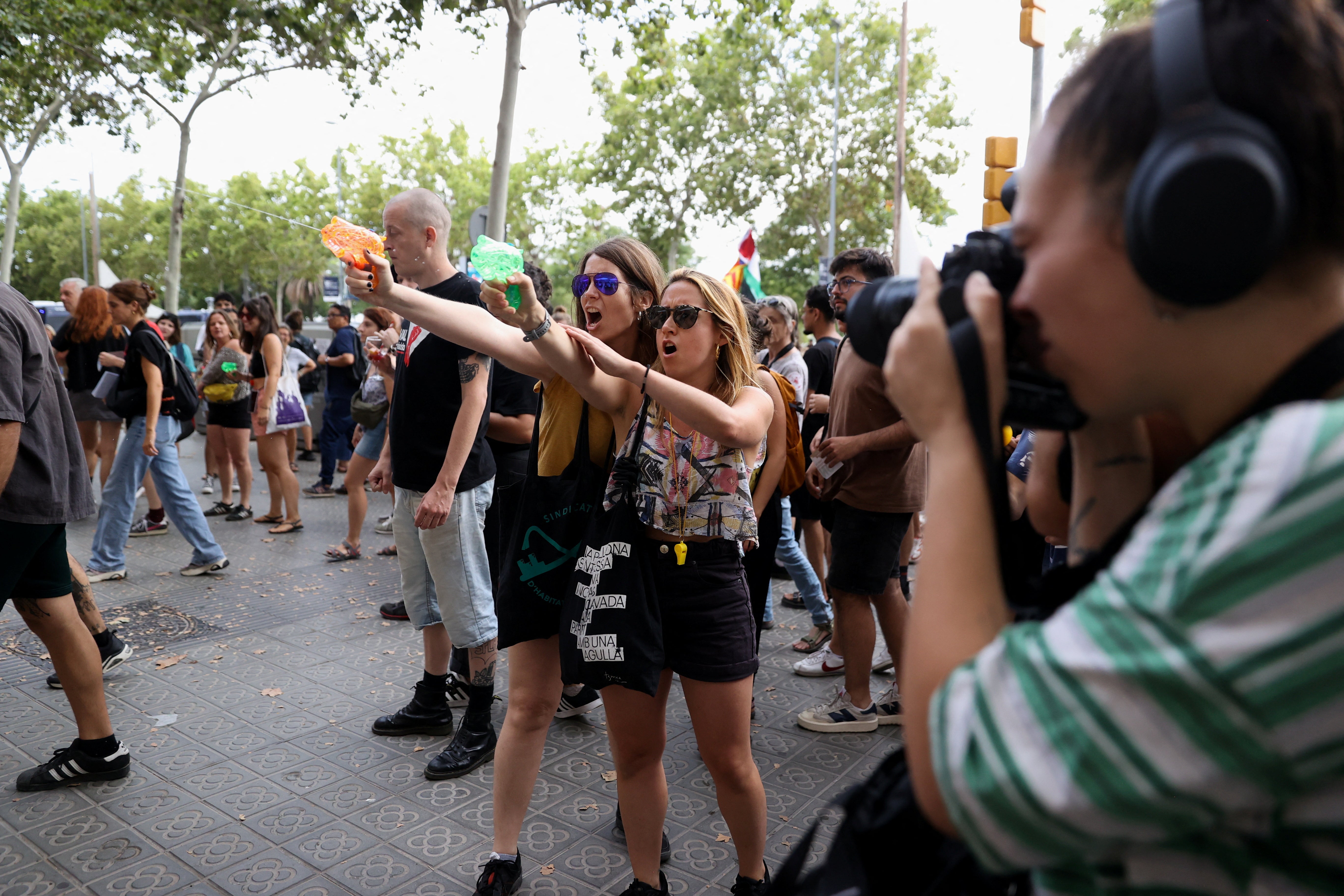 During a protest in Barcelona’s Las Ramblas district this month some participants squirted water pistols at people seated at outdoor tables